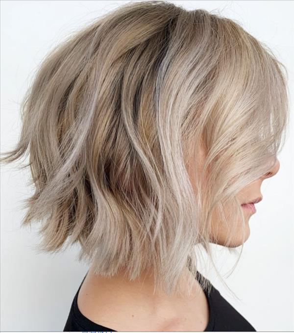 bob cut with curtain bangs