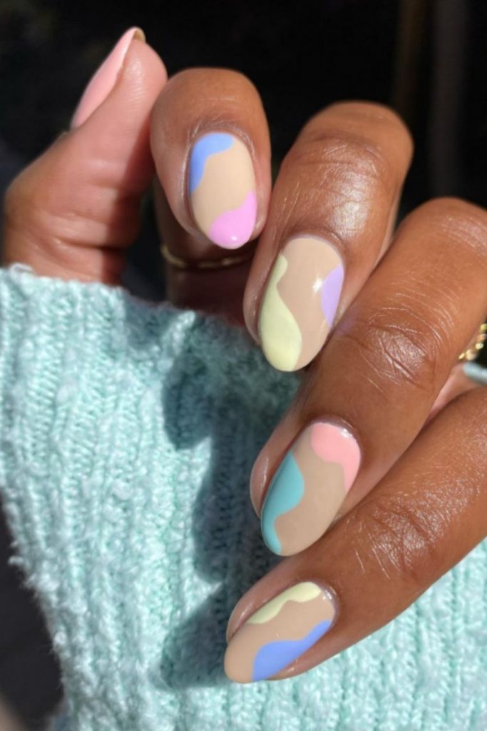 Awesome pastel nails with short almond-shaped nails to spice up your look!