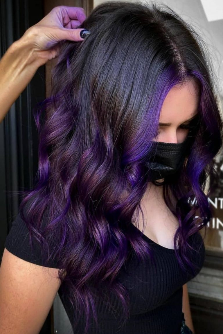 dark purple hair on brown skin