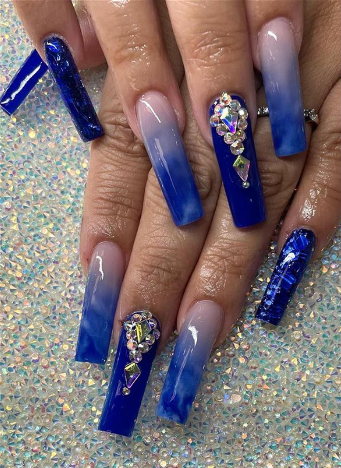 Adorable blue coffin nails for Winter nail colors 2021