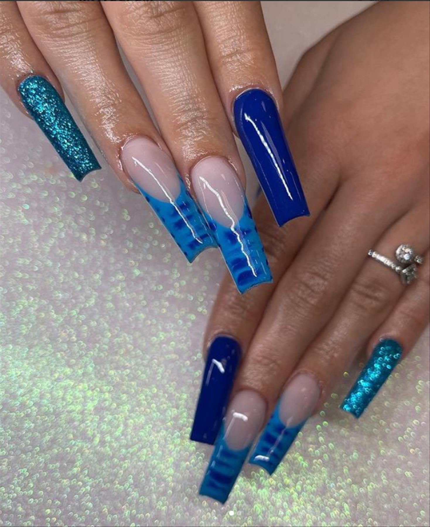 Adorable blue coffin nails for Winter nail colors 2021