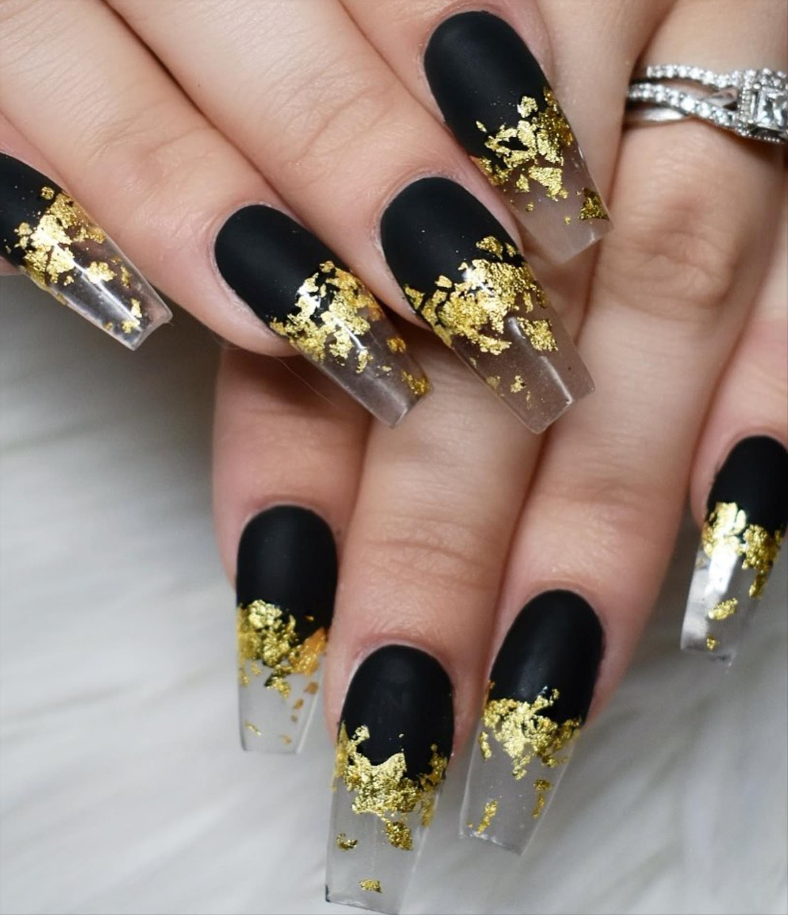 Edgy grunge acrylic nail ideas with black manicures