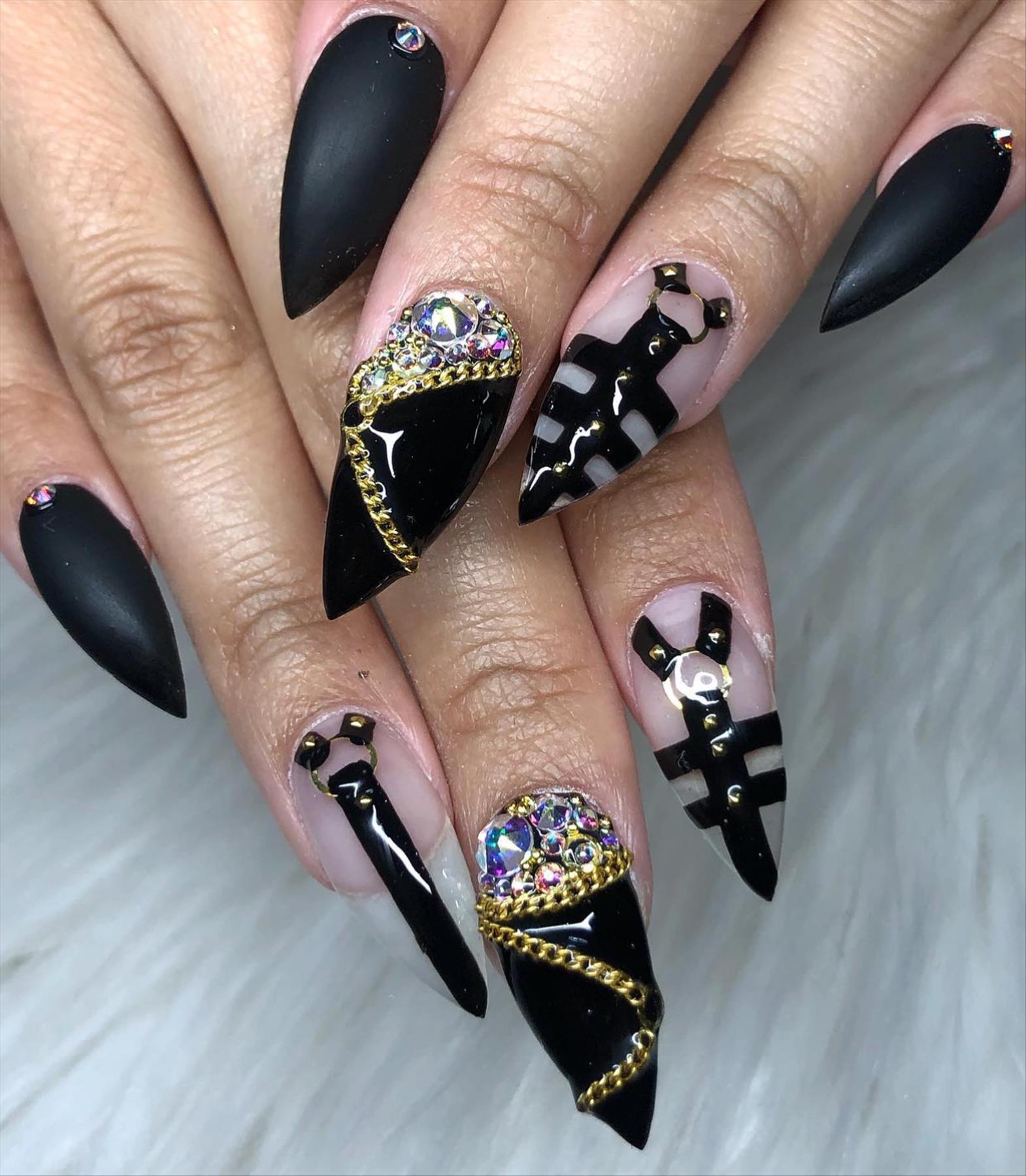 Edgy grunge acrylic nail ideas with black manicures