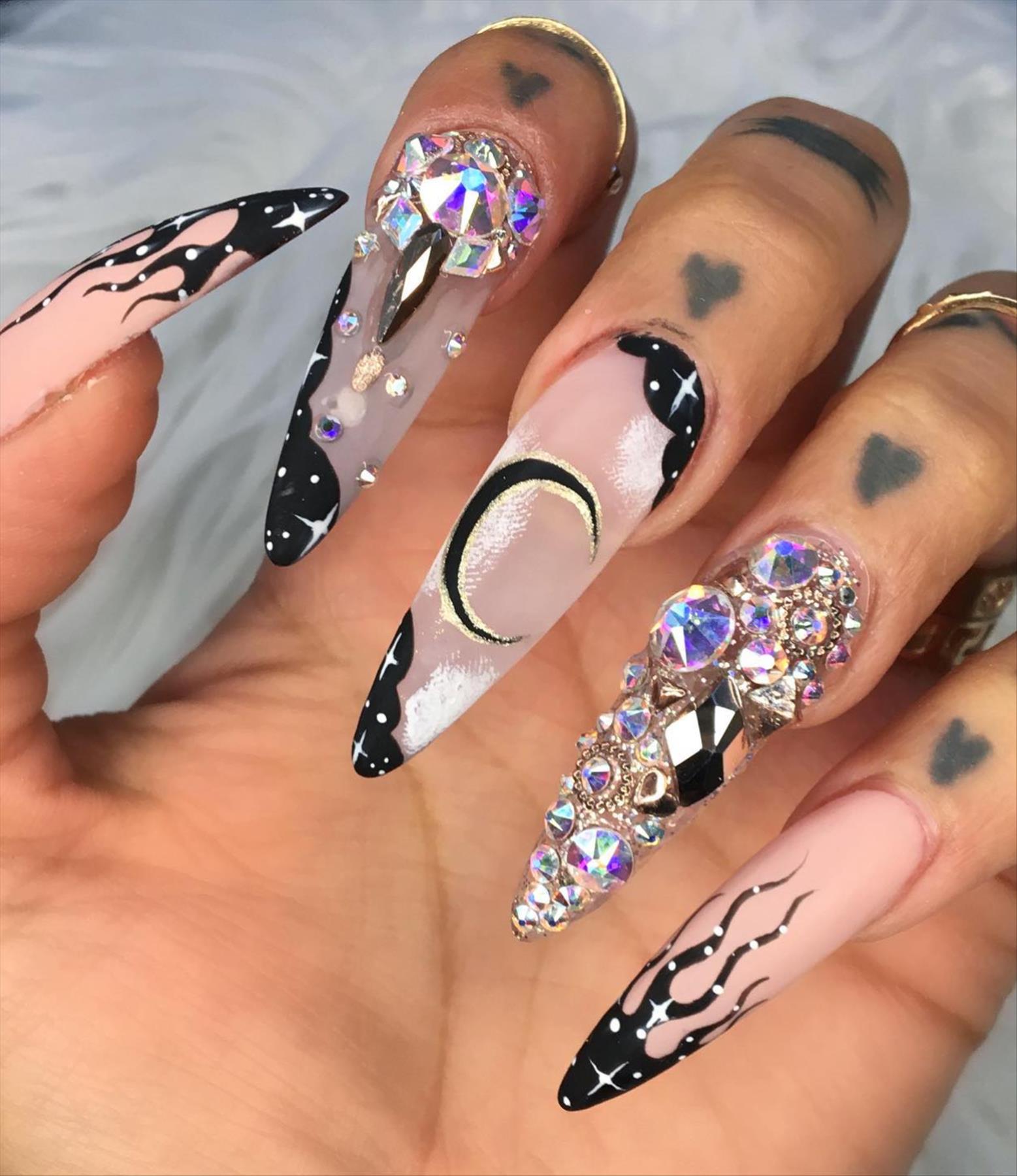 Edgy grunge acrylic nail ideas with black manicures