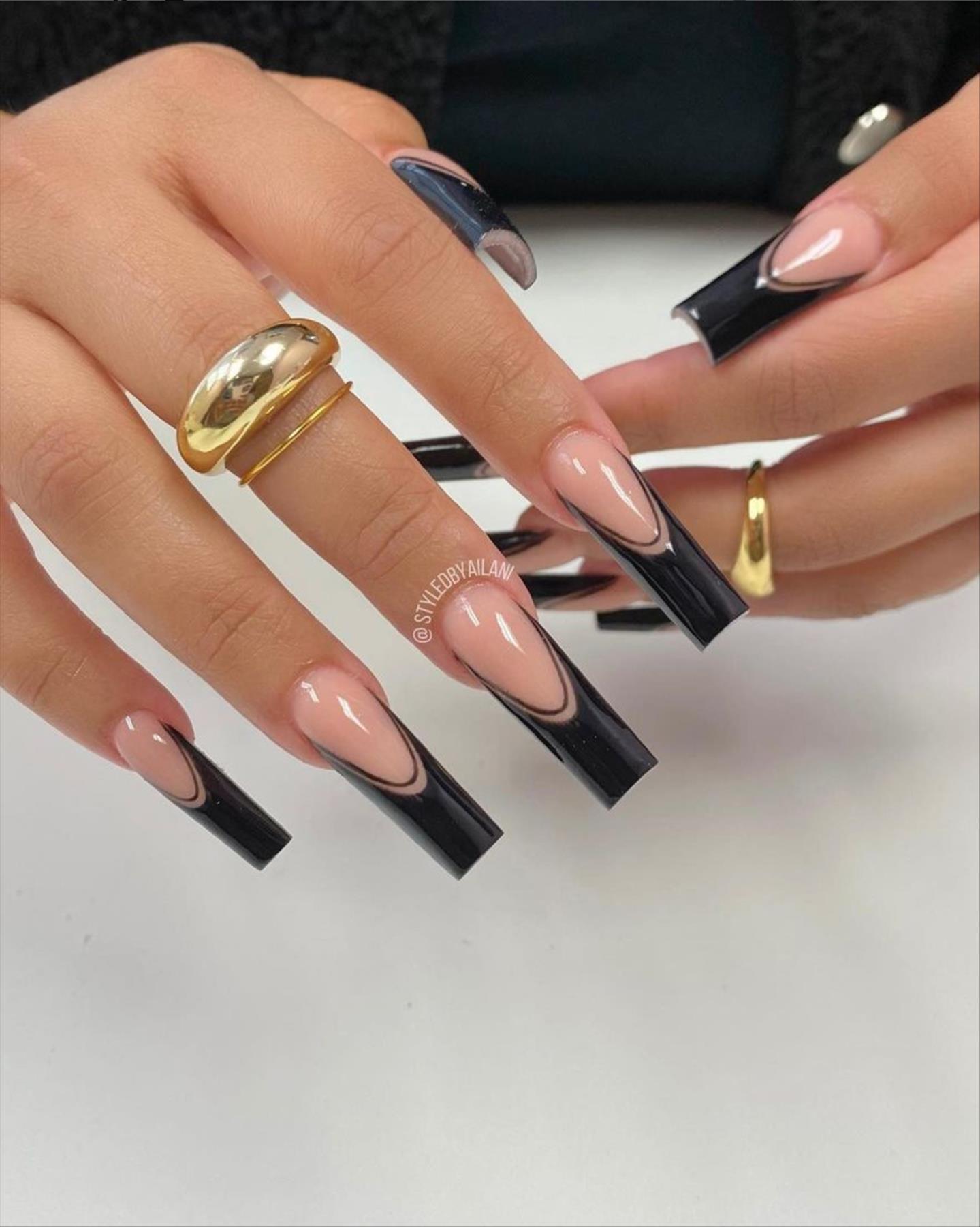 Edgy grunge acrylic nail ideas with black manicures