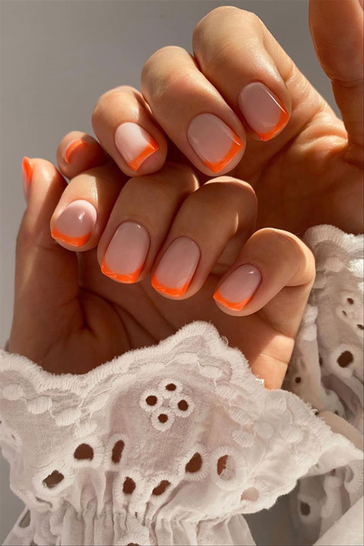 Bright Neon orange nails for summer nail colors 2022