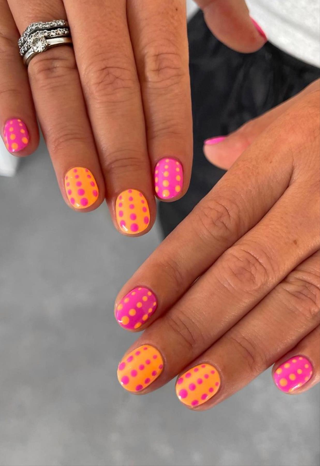 Bright Neon orange nails for summer nail colors 2022