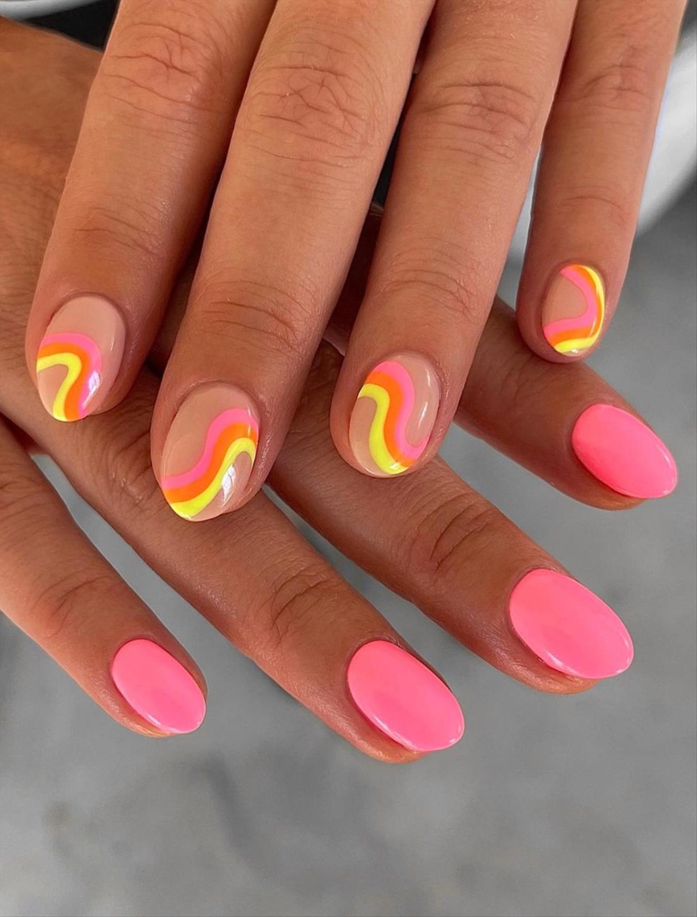 Bright Neon orange nails for summer nail colors 2022