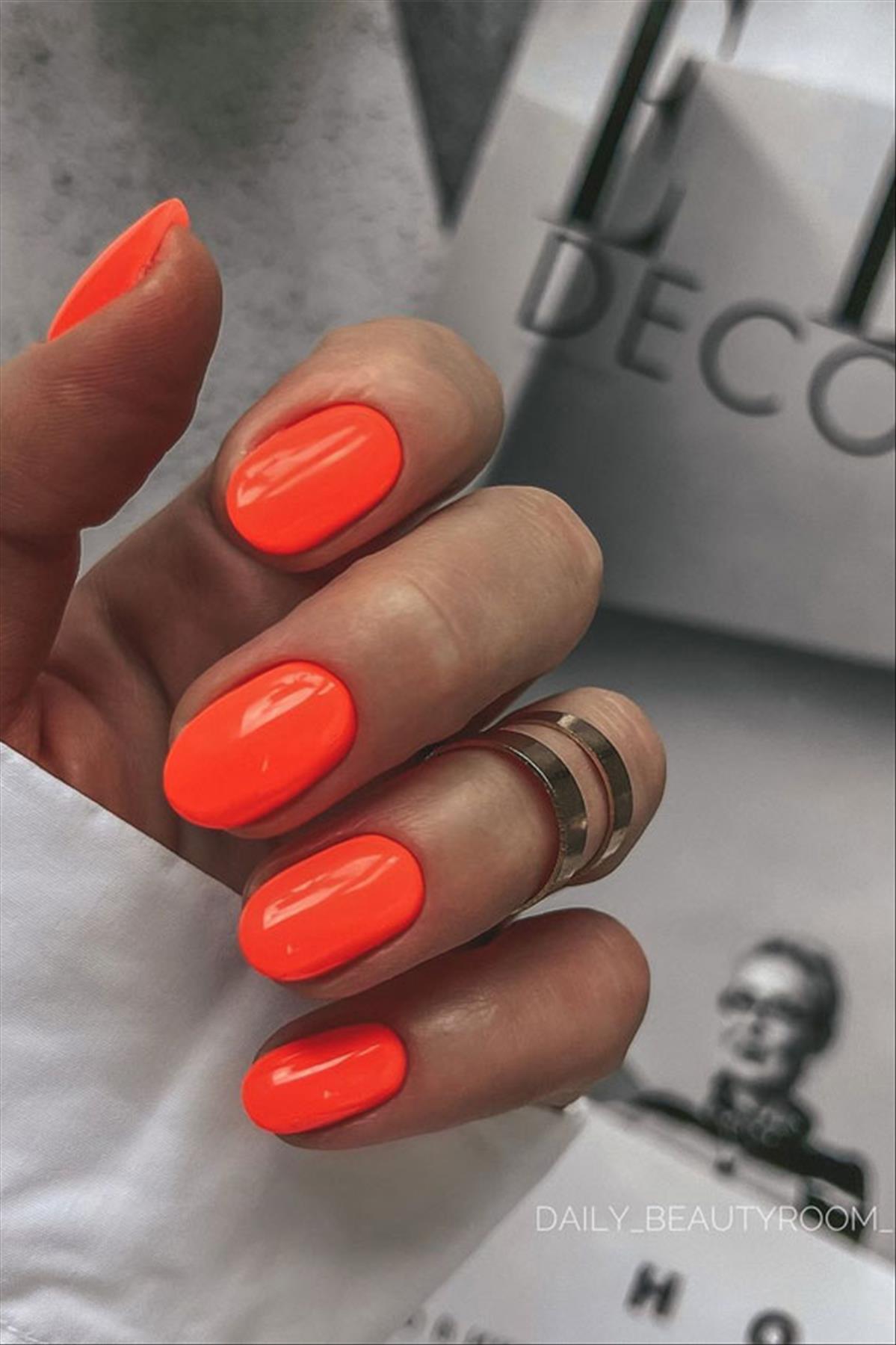 Bright Neon orange nails for summer nail colors 2022