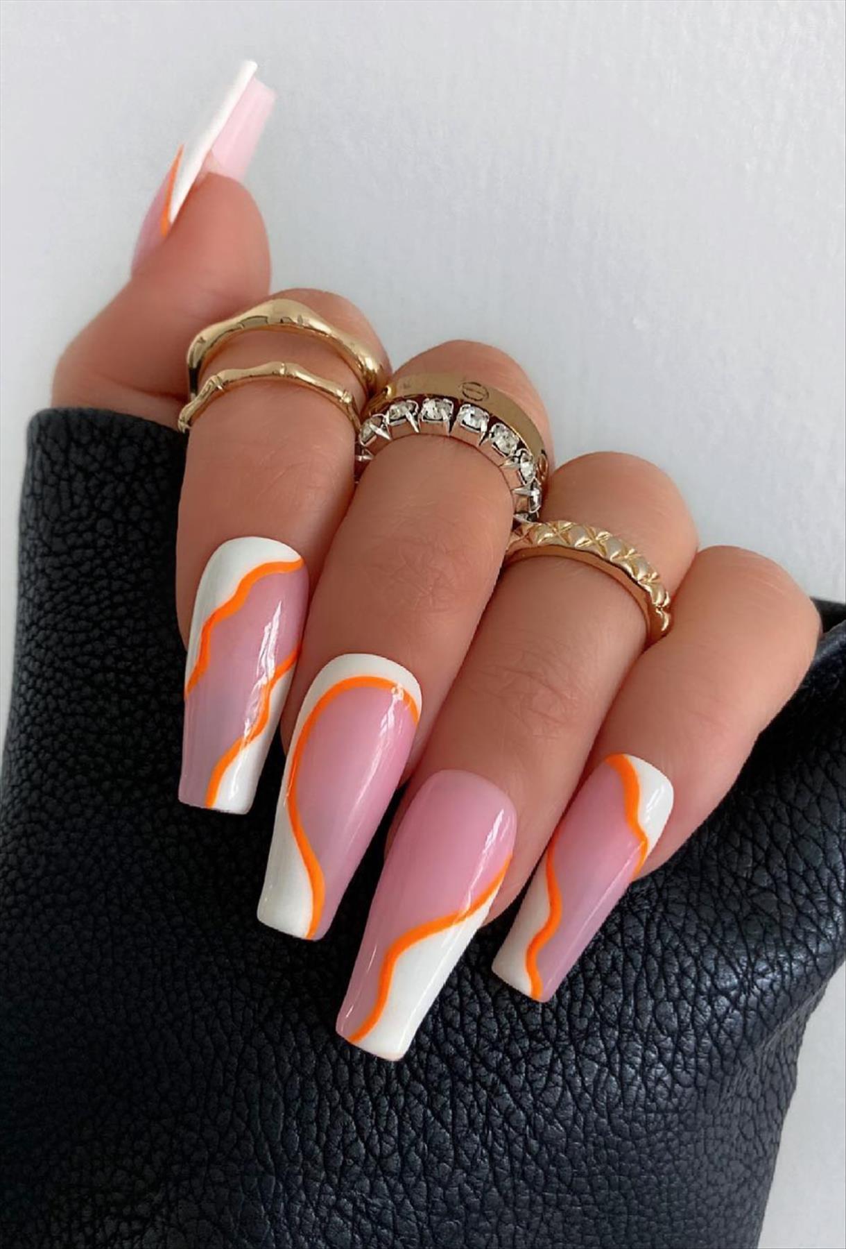 Bright Neon orange nails for summer nail colors 2022