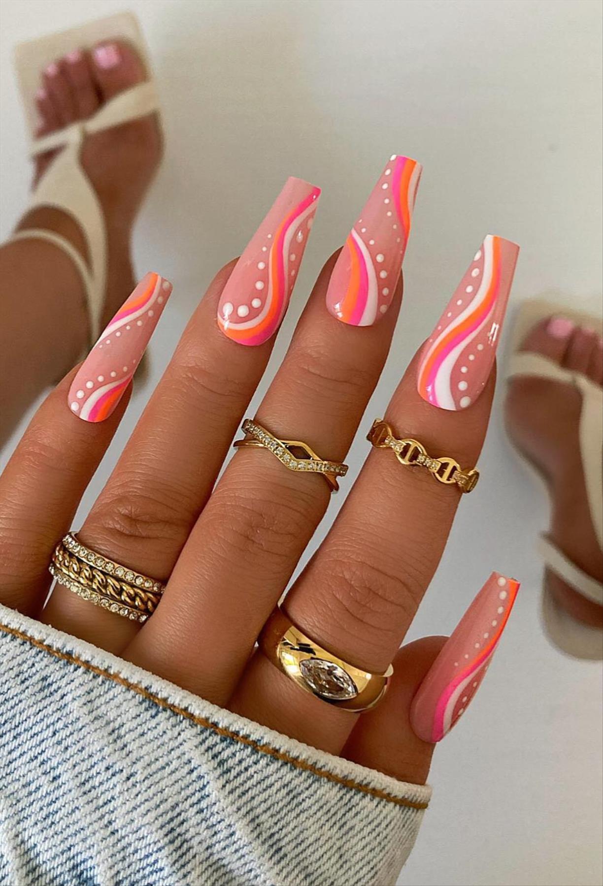 Bright Neon orange nails for summer nail colors 2022