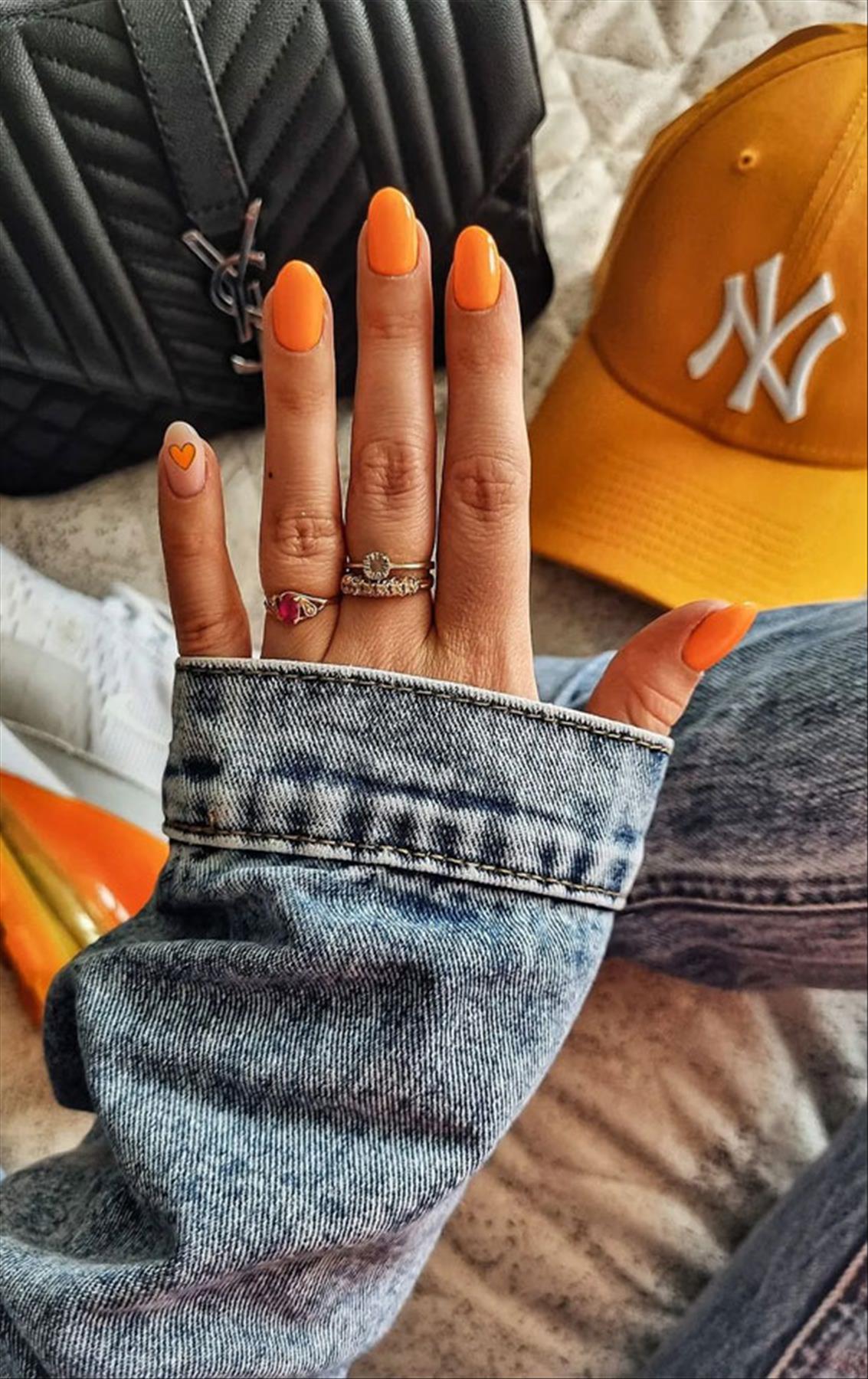 Bright Neon orange nails for summer nail colors 2022