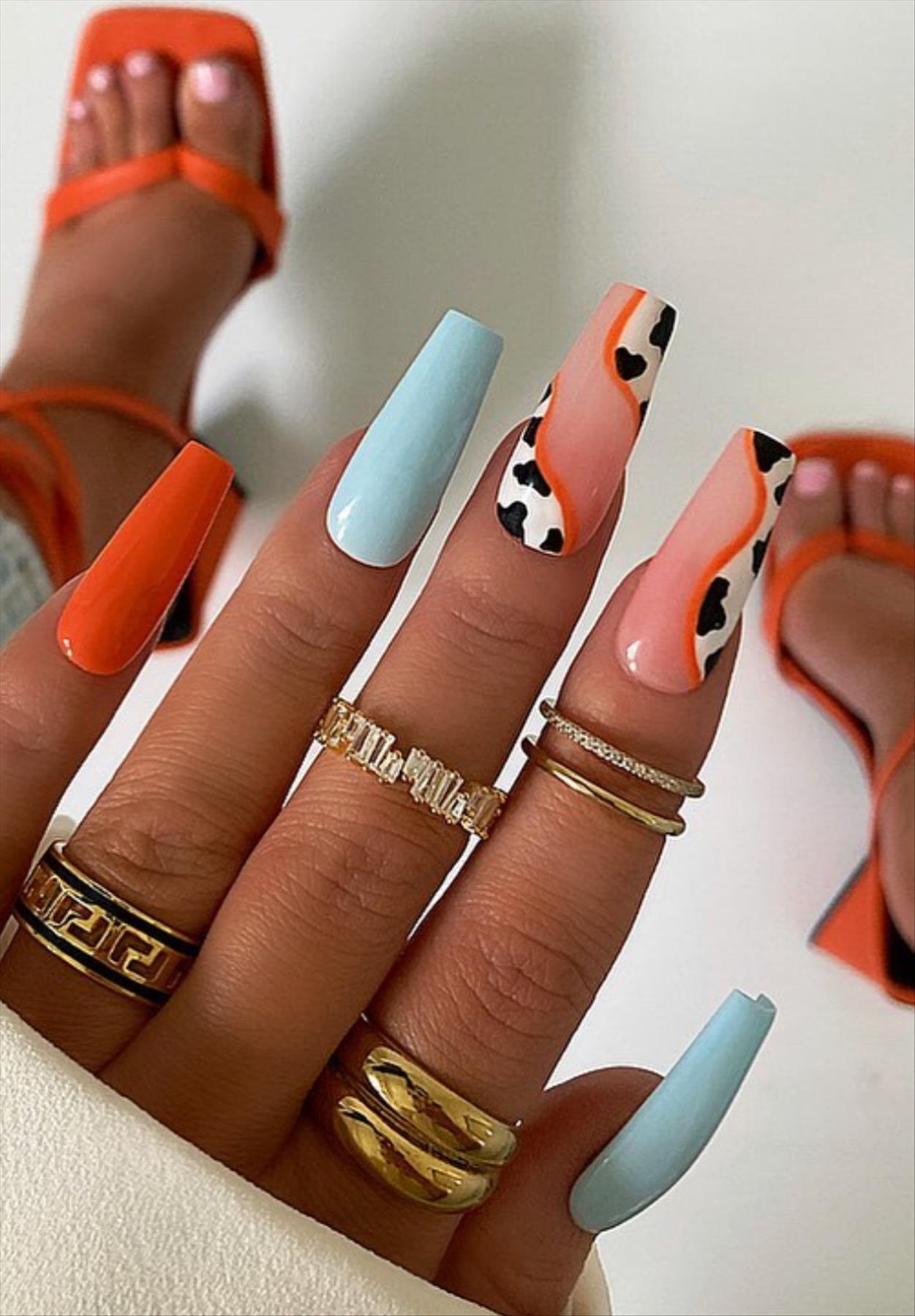 Bright Neon orange nails for summer nail colors 2022