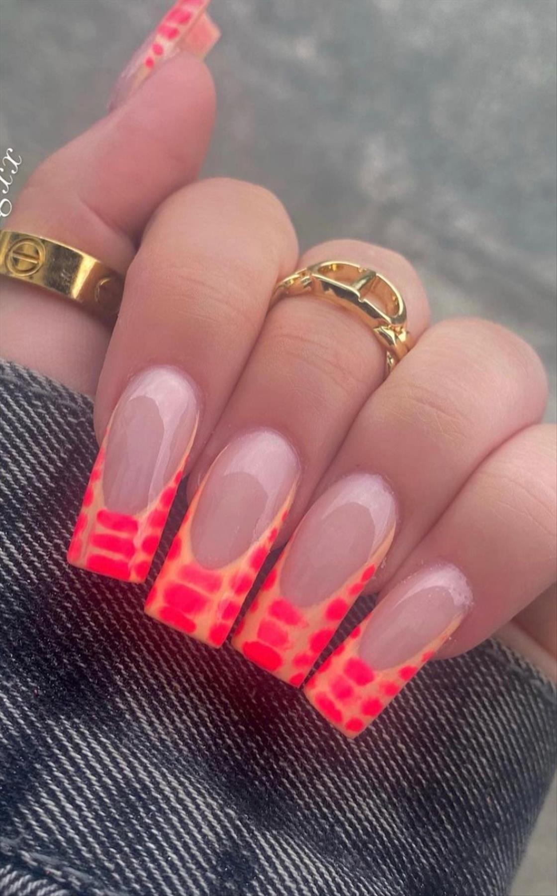 Bright Neon orange nails for summer nail colors 2022