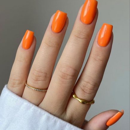 Bright Neon orange nails for summer nail colors 2022