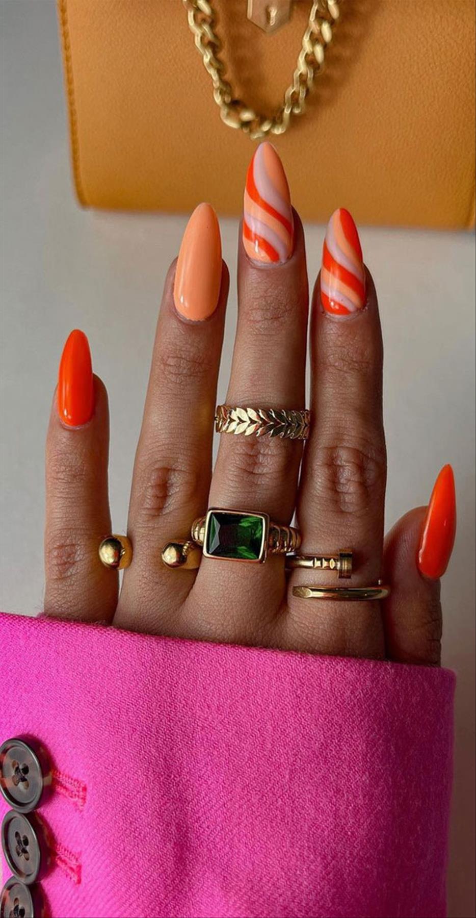 Bright Neon orange nails for summer nail colors 2022