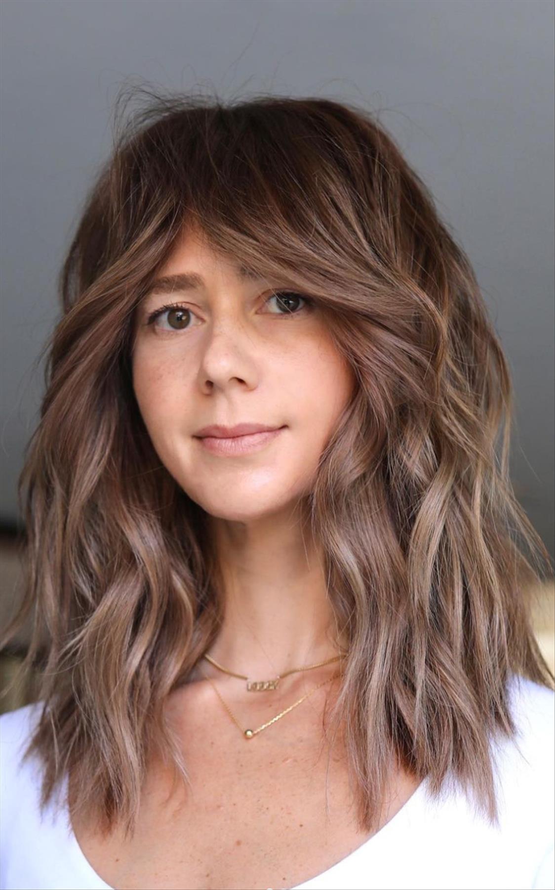 Cool shoulder length haircuts with bangs to try now