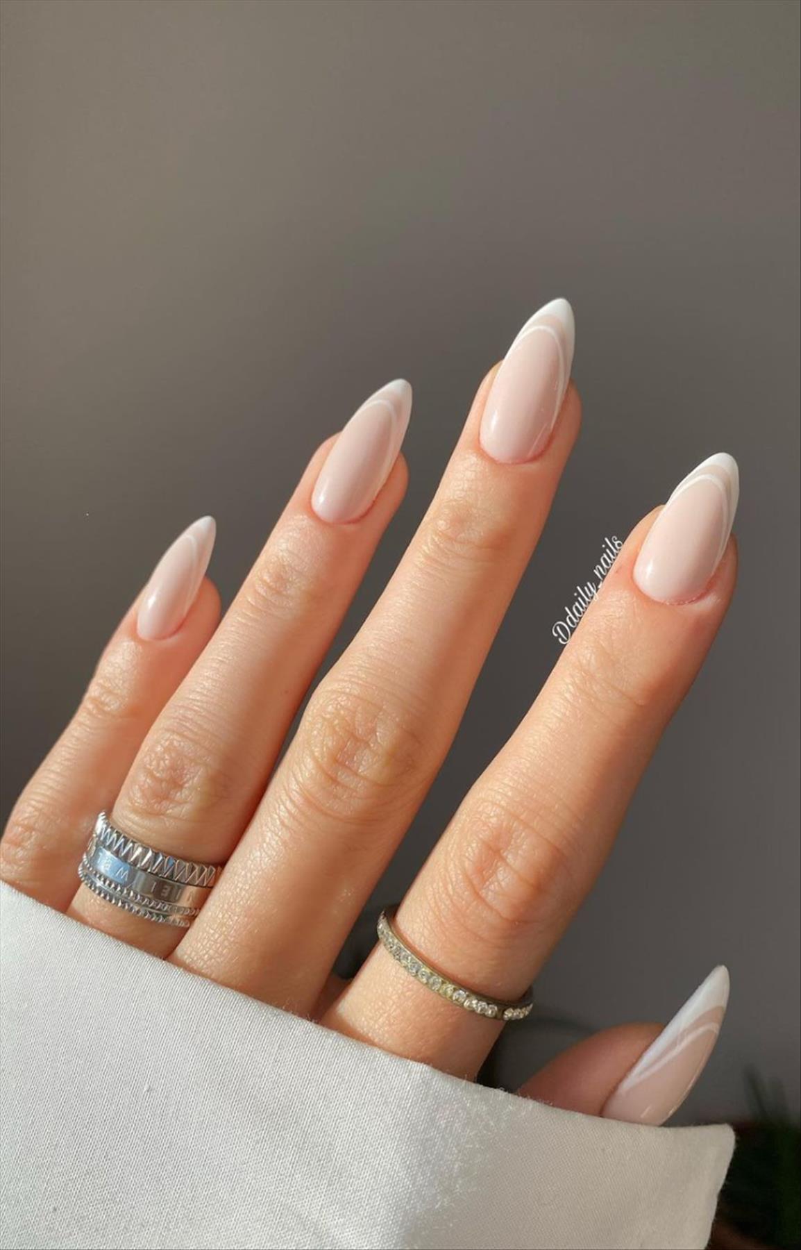 Elegant nude almond nails design for Spring mani 2023