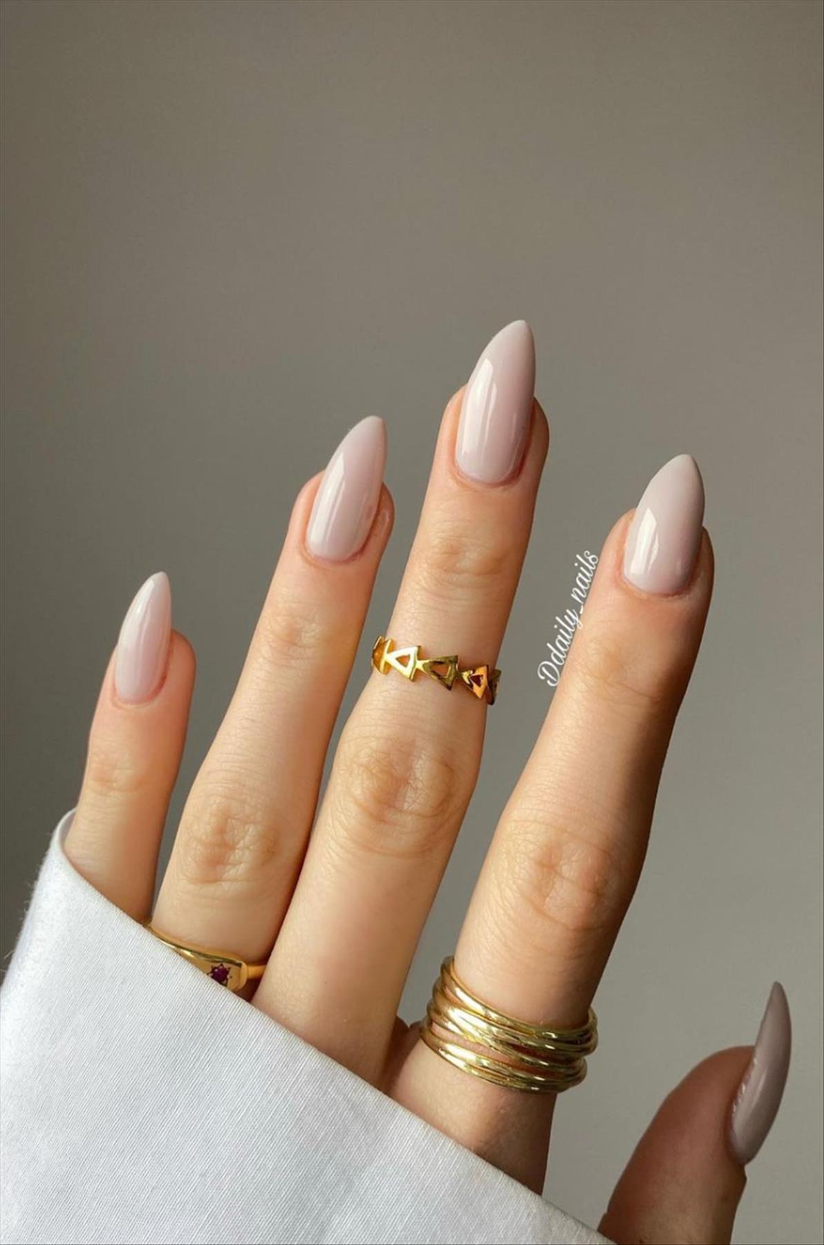 Elegant nude almond nails design for Spring mani 2023