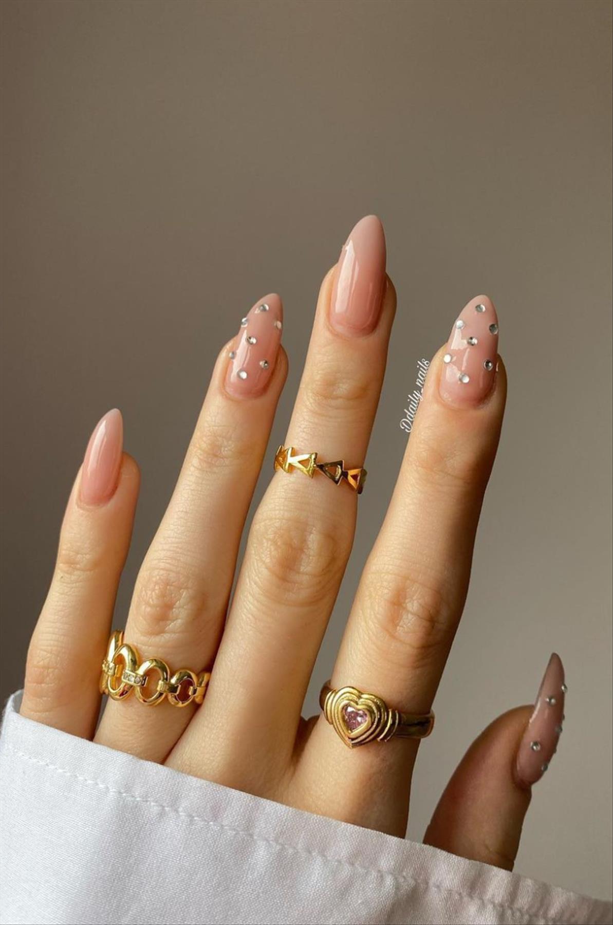 Elegant nude almond nails design for Spring mani 2023