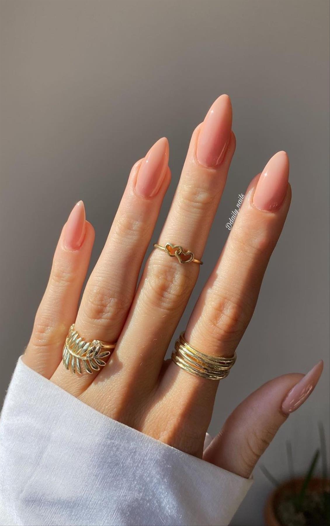 Elegant nude almond nails design for Spring mani 2023