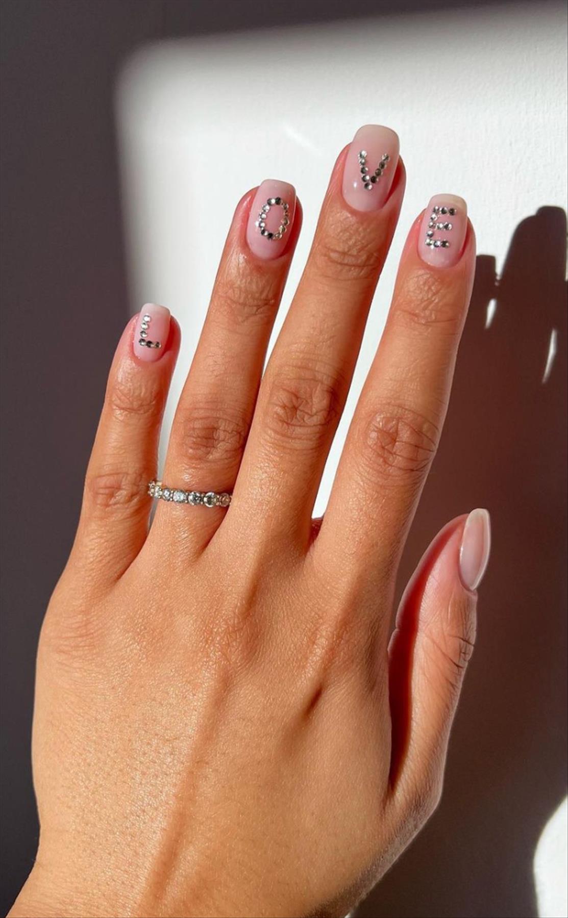 Elegant white Valentine's Day nail designs you'll love