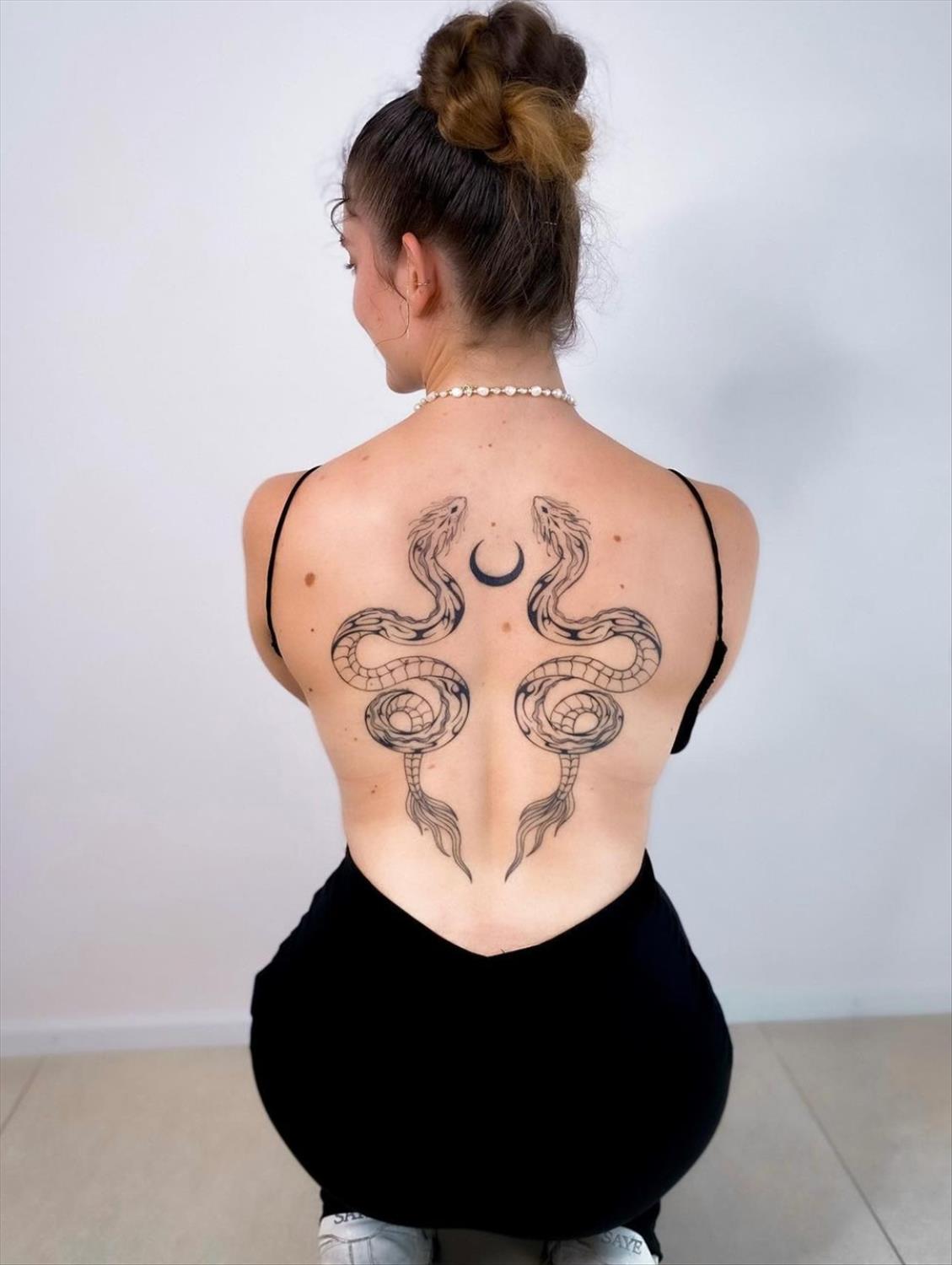 Unique and Charming Back Tattoo Designs for Women