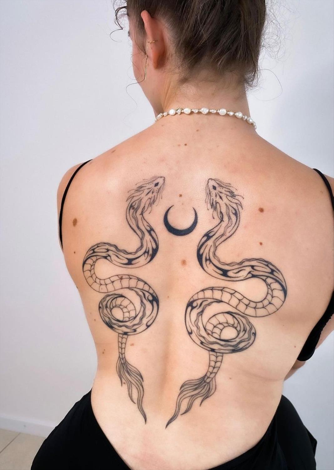 Unique and Charming Back Tattoo Designs for Women