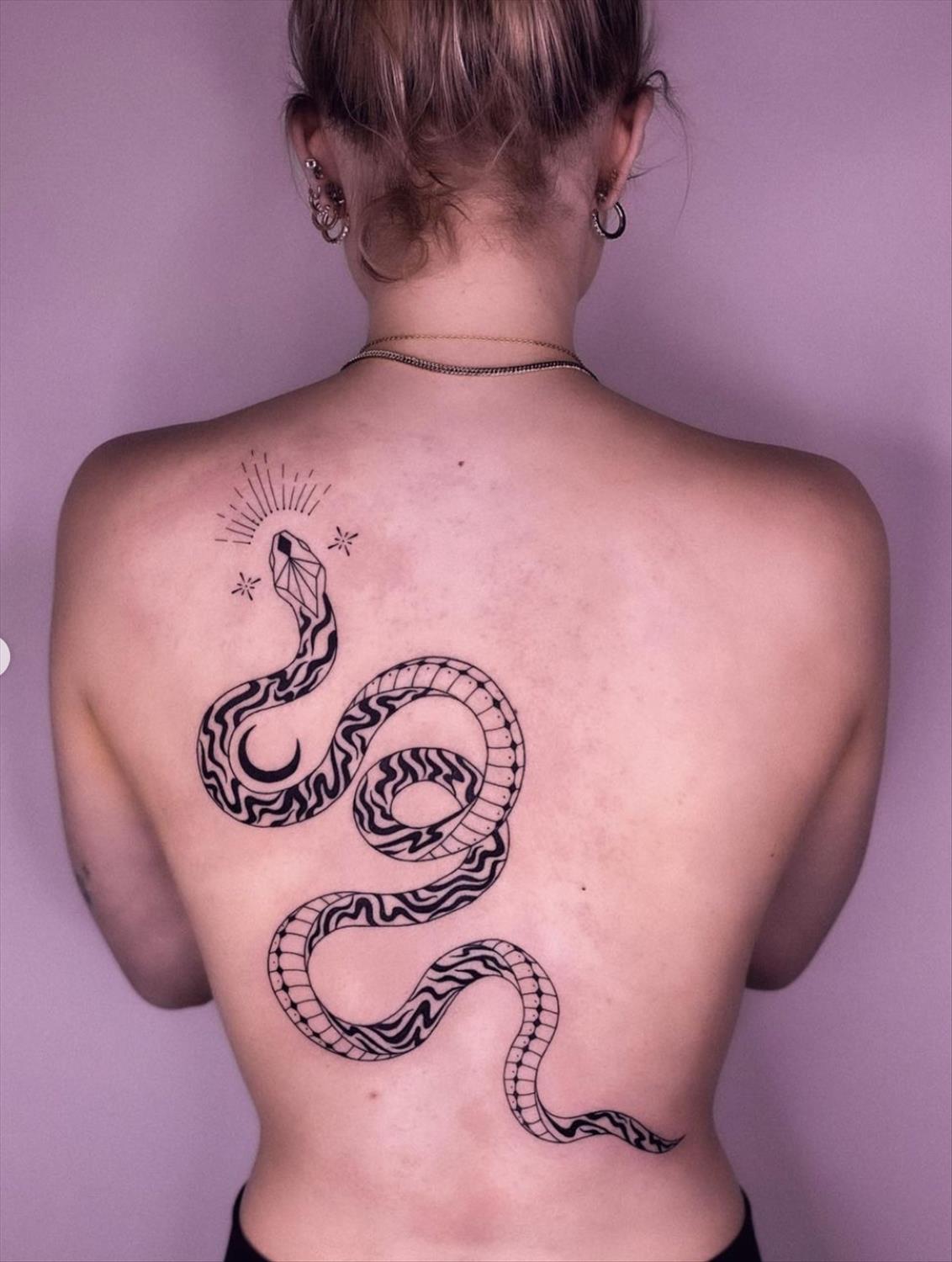 Unique and Charming Back Tattoo Designs for Women