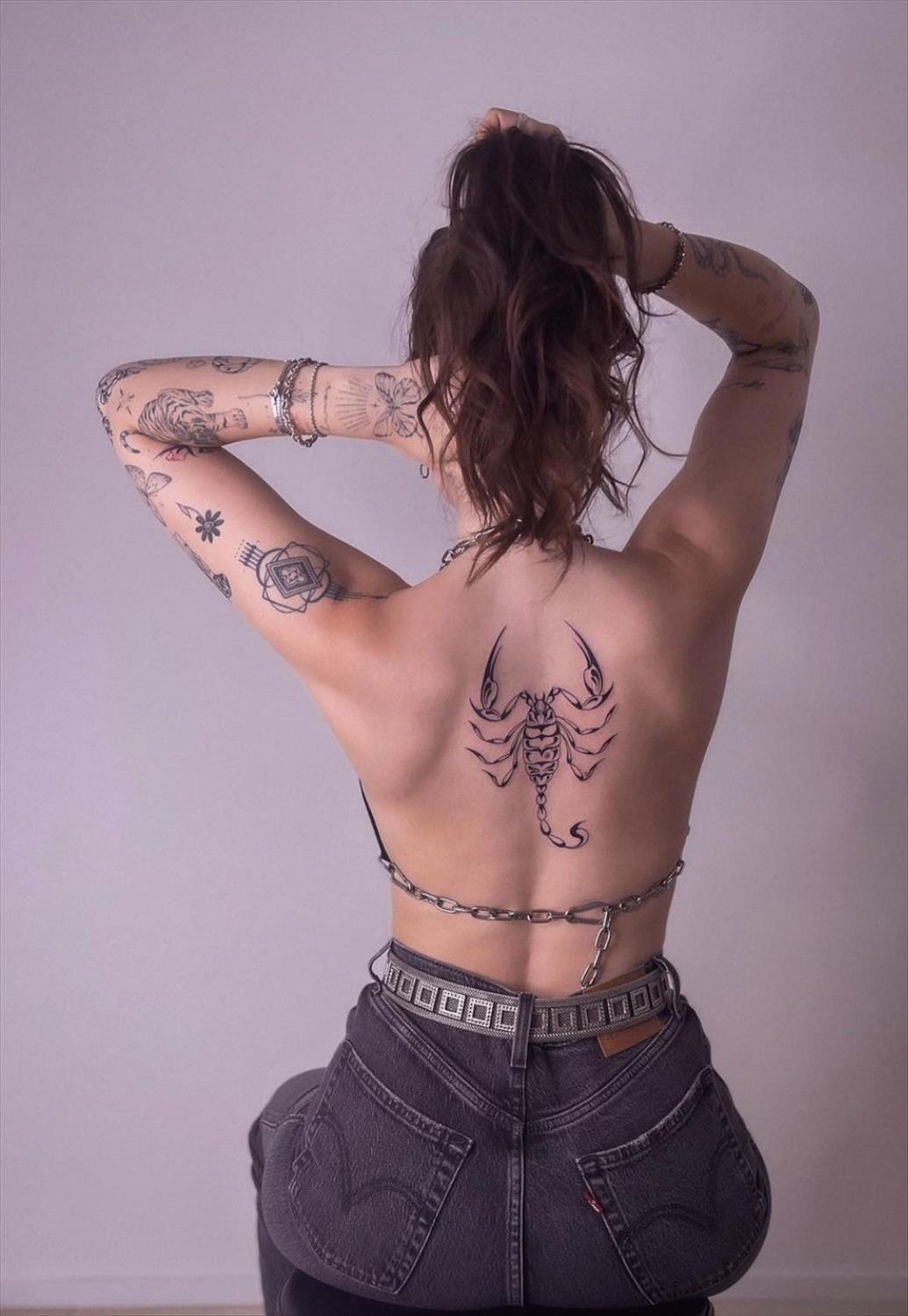 Unique and Charming Back Tattoo Designs for Women