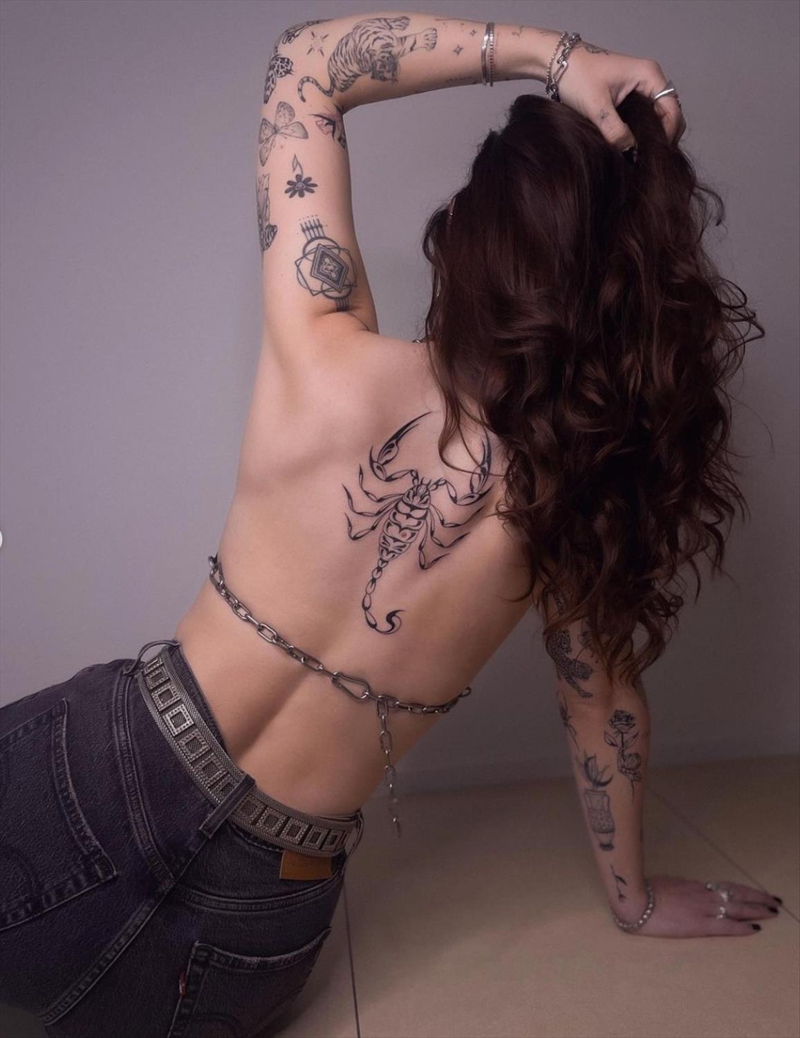 Unique and Charming Back Tattoo Designs for Women