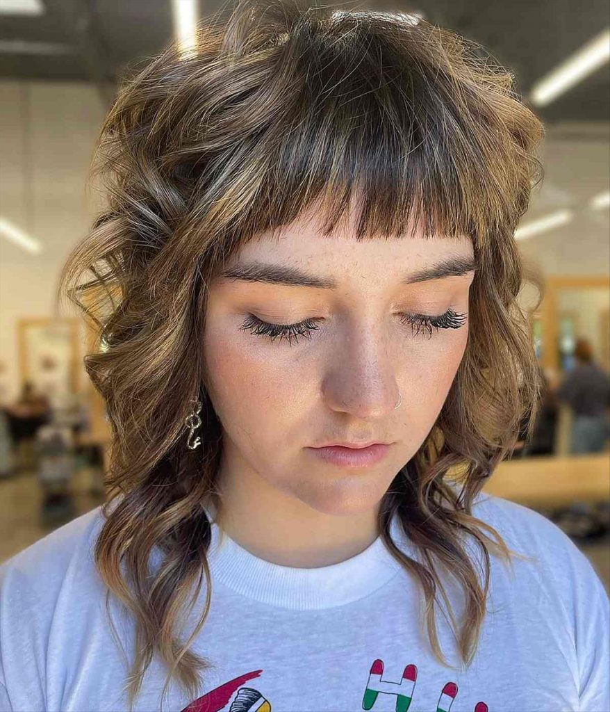 Stylish shaggy haircuts with bangs for girls with big foreheads